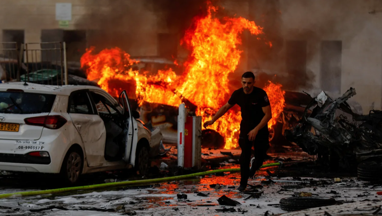 Fire burns in Ashkelon, Israel. after rockets were launched from the Gaza Strip on October 7, 2023.